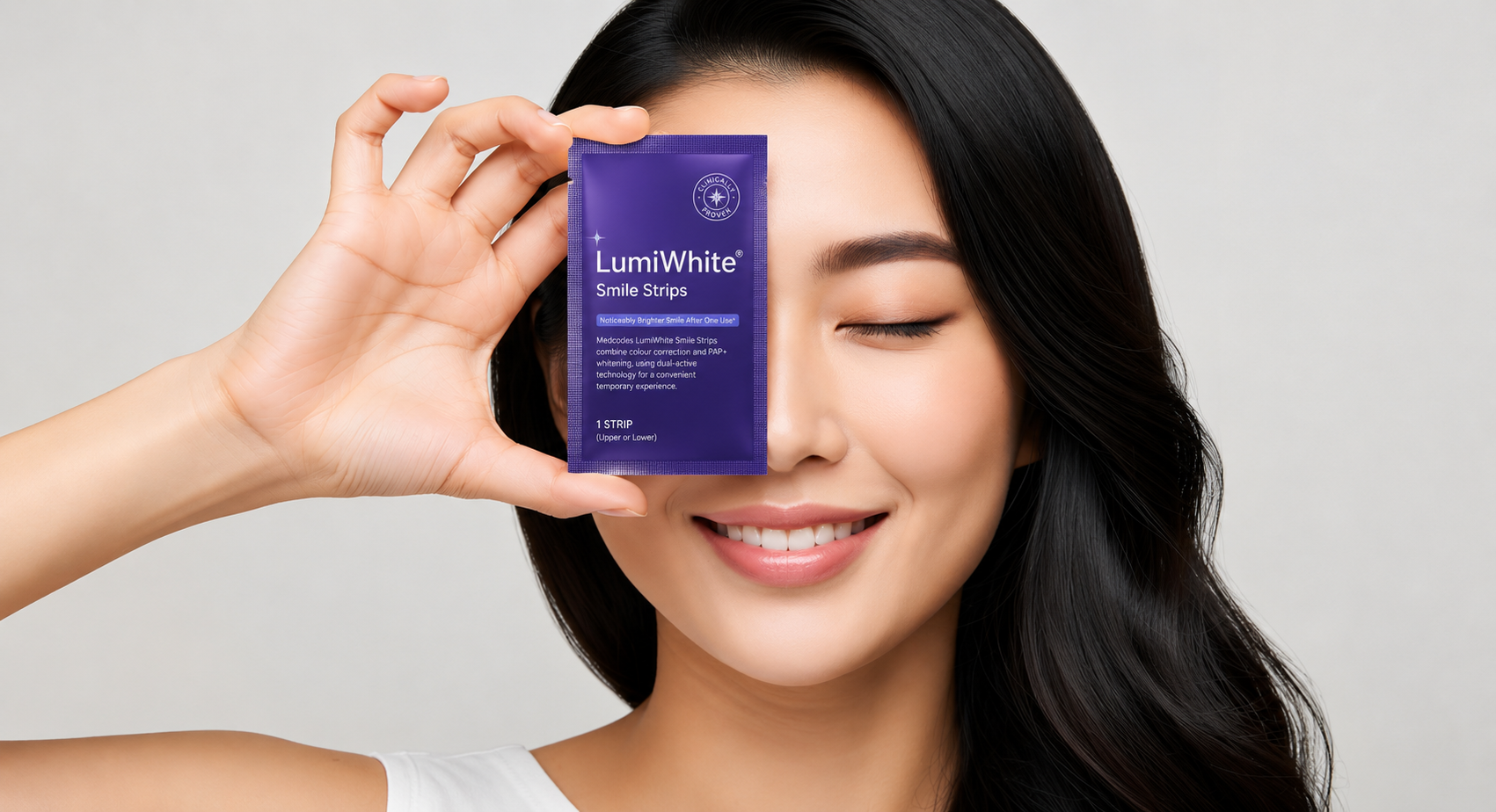 Woman holding LumiWhite Smile Strips